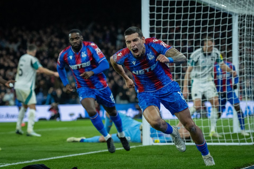 Soccer player celebrating a goal.
