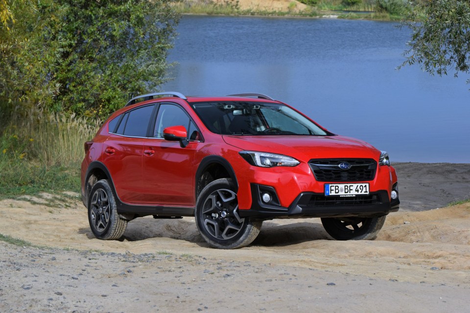 a red suv with a license plate that says fb bf 491