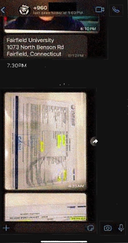 a phone screen shows a message from fairfield university