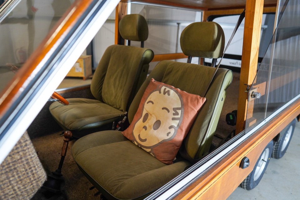 Interior of a wooden Hustler 6-wheeler car.