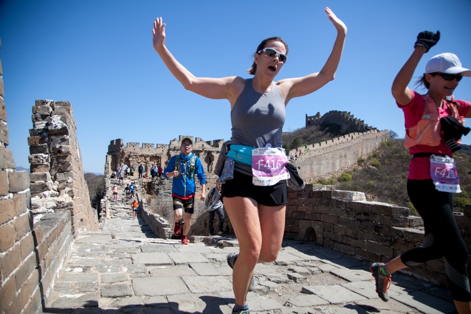Runners compete in a marathon along the Great Wall of China.