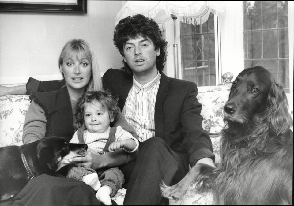 Actress Carol Royle with her husband, son, and two dogs.