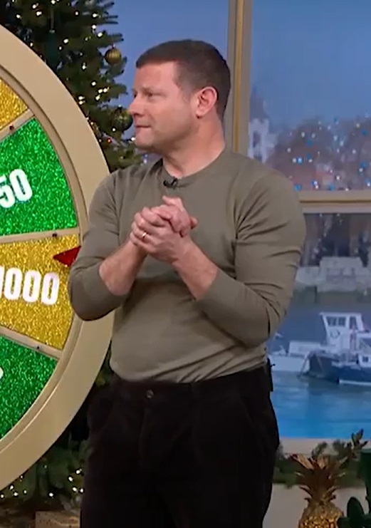 Dermot O'Leary on a game show set.