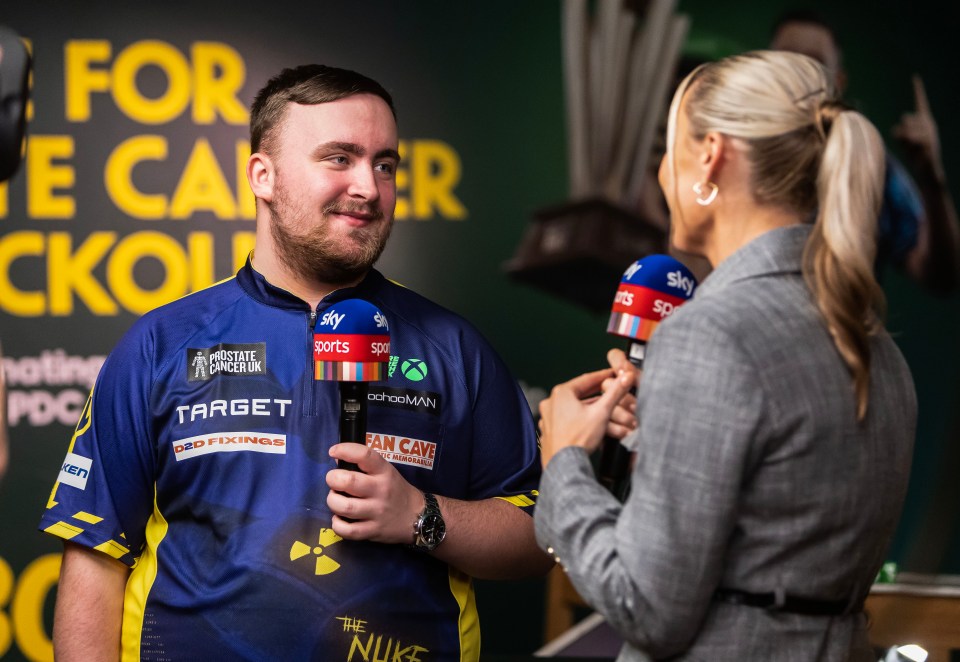 Darts player being interviewed.