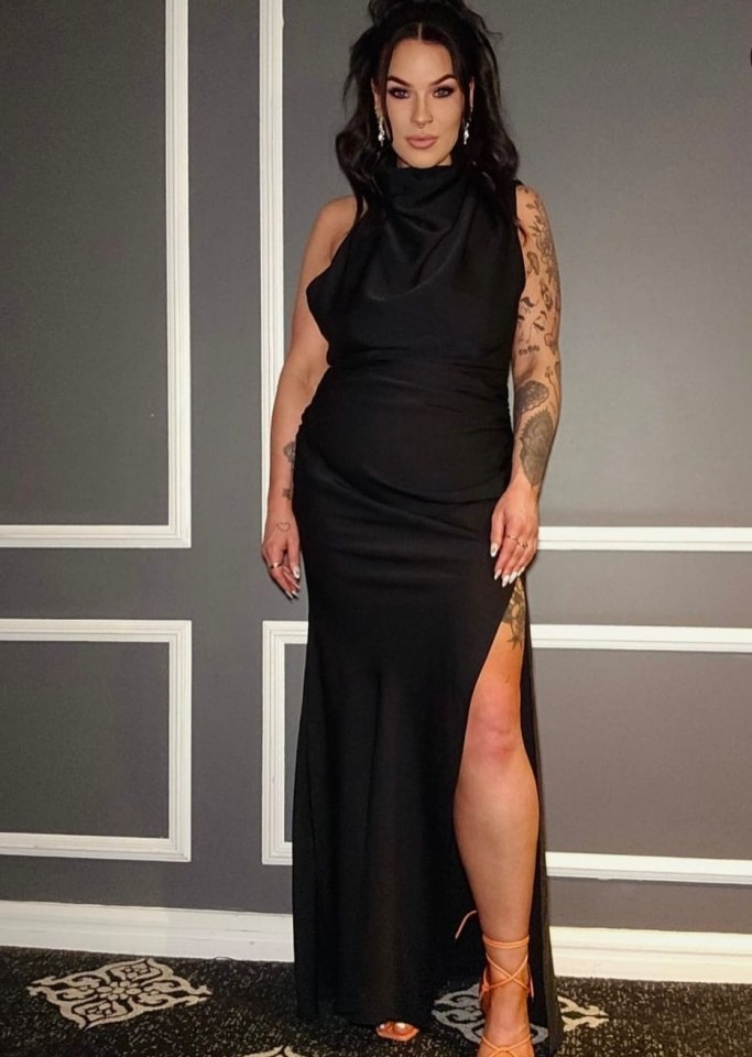Woman in a black dress.