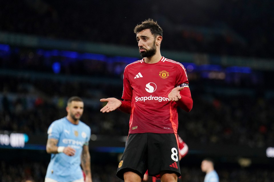 Bruno Fernandes of Manchester United looks dejected on the pitch.