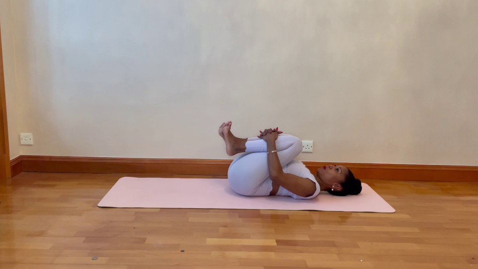 Yoga pose to relieve trapped wind.