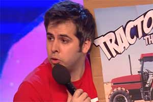 Comedian Chris Leworthy holding a microphone and a sign advertising his dad joke.