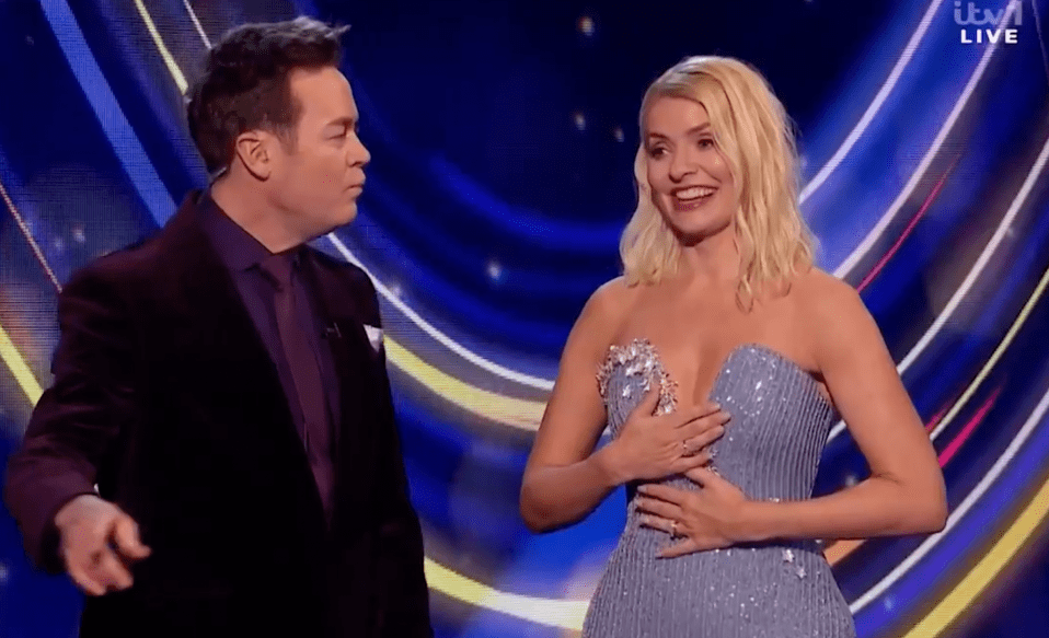 Screenshot of Holly Willoughby and a male presenter on a TV show.