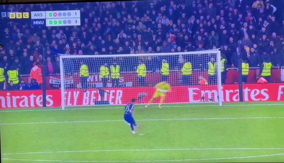 Soccer player taking a penalty kick.