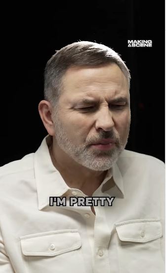 David Walliams in a white shirt.