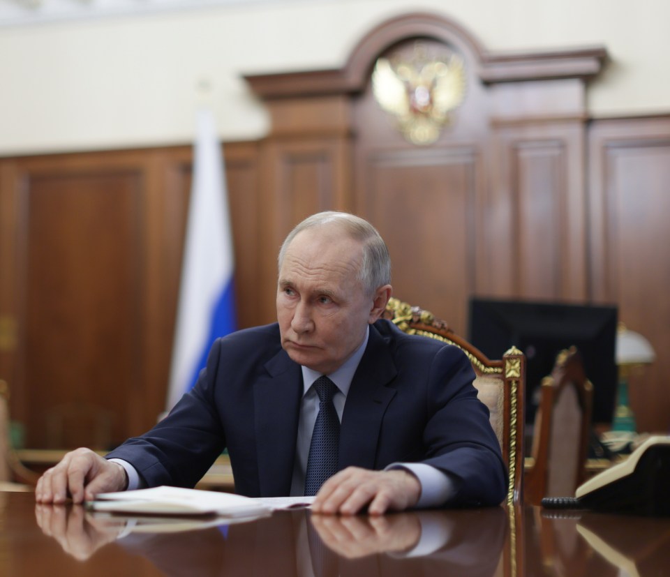 Vladimir Putin at a meeting in the Kremlin.