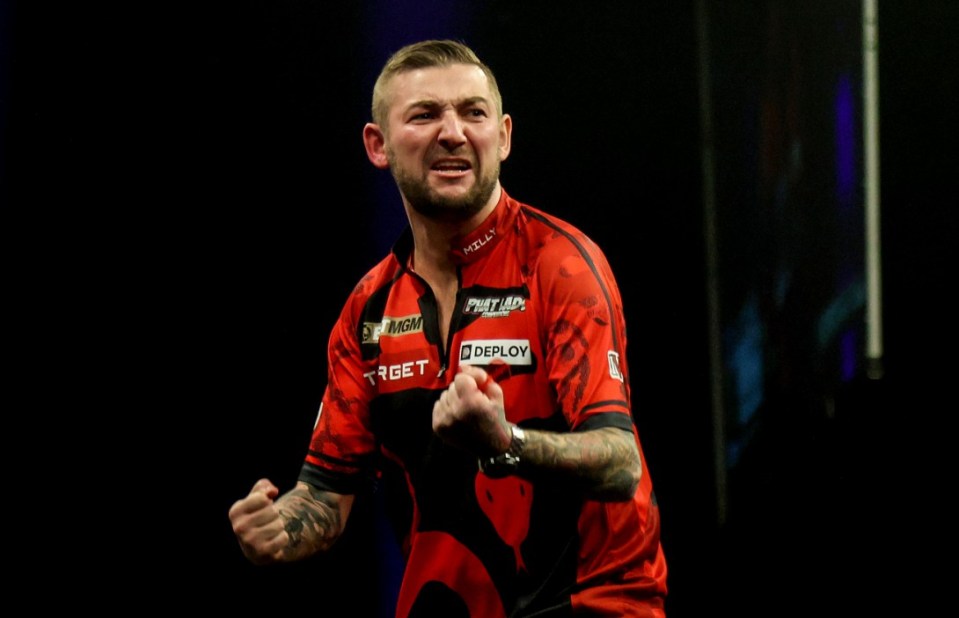 Nathan Aspinall celebrates winning his match against Michael van Gerwen on night three of the 2025 BetMGM Premier League at the 3Arena in Dublin, Ireland. Picture date: Thursday February 20, 2025. PA Photo. See PA story DARTS Dublin. Photo credit should read: Evan Treacy/PA Wire. RESTRICTIONS: Use subject to restrictions. Editorial use only, no commercial use without prior consent from rights holder.