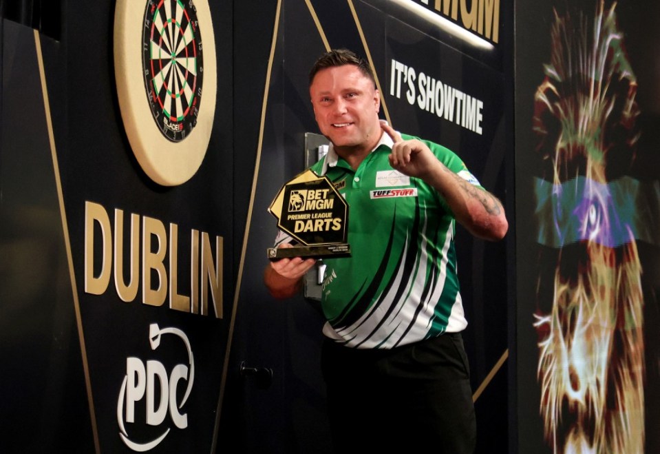 Gerwyn Price celebrates with the trophy after winning the final against Nathan Aspinall on night three of the 2025 BetMGM Premier League at the 3Arena in Dublin, Ireland. Picture date: Thursday February 20, 2025. PA Photo. See PA story DARTS Dublin. Photo credit should read: Evan Treacy/PA Wire. RESTRICTIONS: Use subject to restrictions. Editorial use only, no commercial use without prior consent from rights holder.