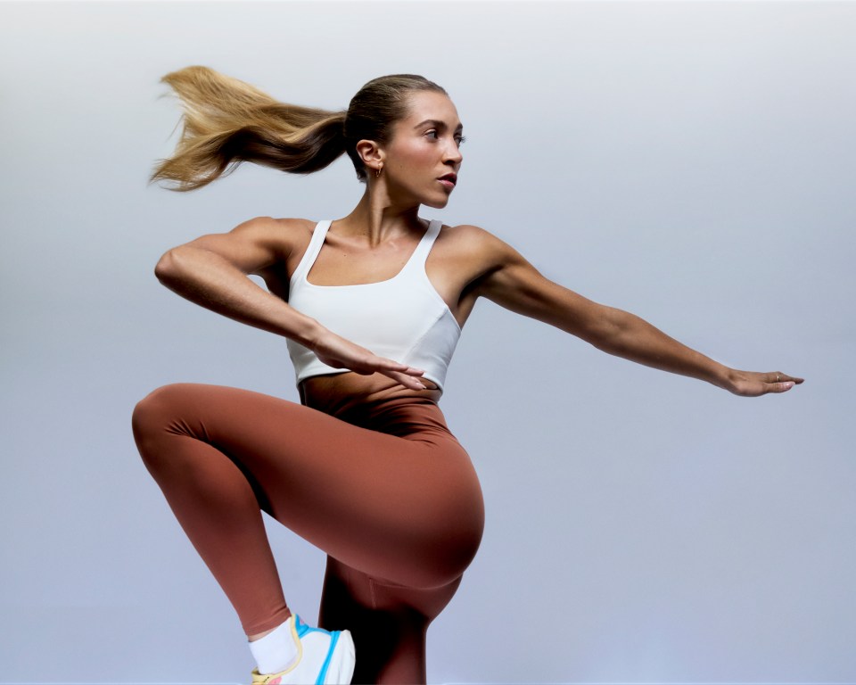Woman in athletic wear exercising.