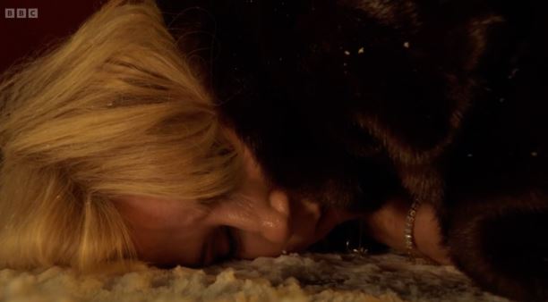 Cindy Beale lying on the ground, appearing injured.