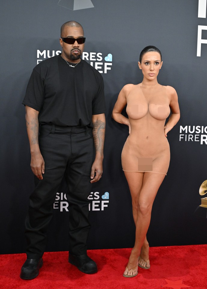 Kanye West and Bianca Censori at the Grammy Awards.  (Image contains nudity)