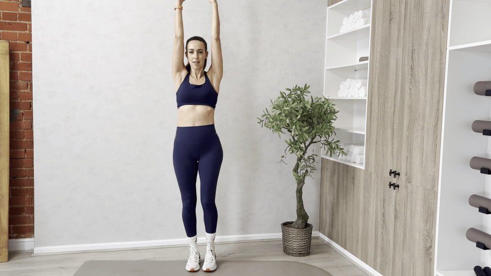 Woman demonstrating a fitness exercise.