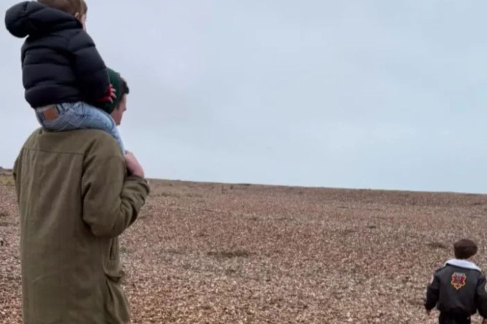 Family on a beach.