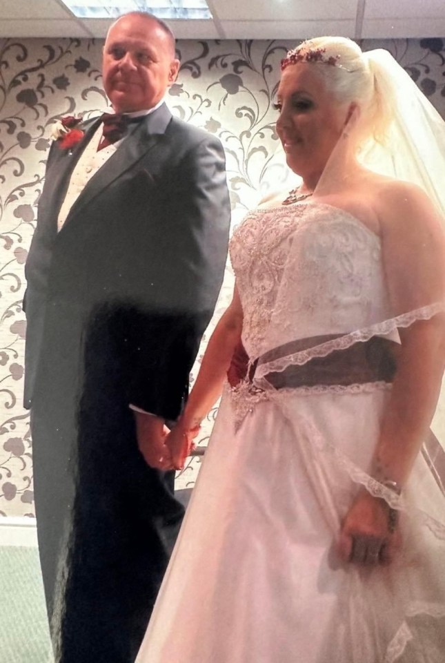 A bride and groom holding hands on their wedding day.