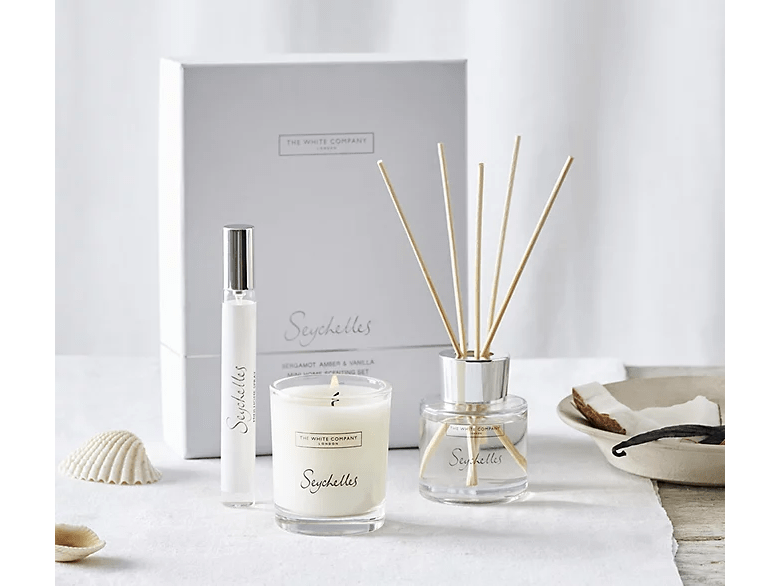 Seychelles aromatherapy gift set with candle, reed diffuser, and room spray.