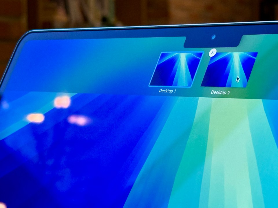 Laptop screen displaying two desktops.