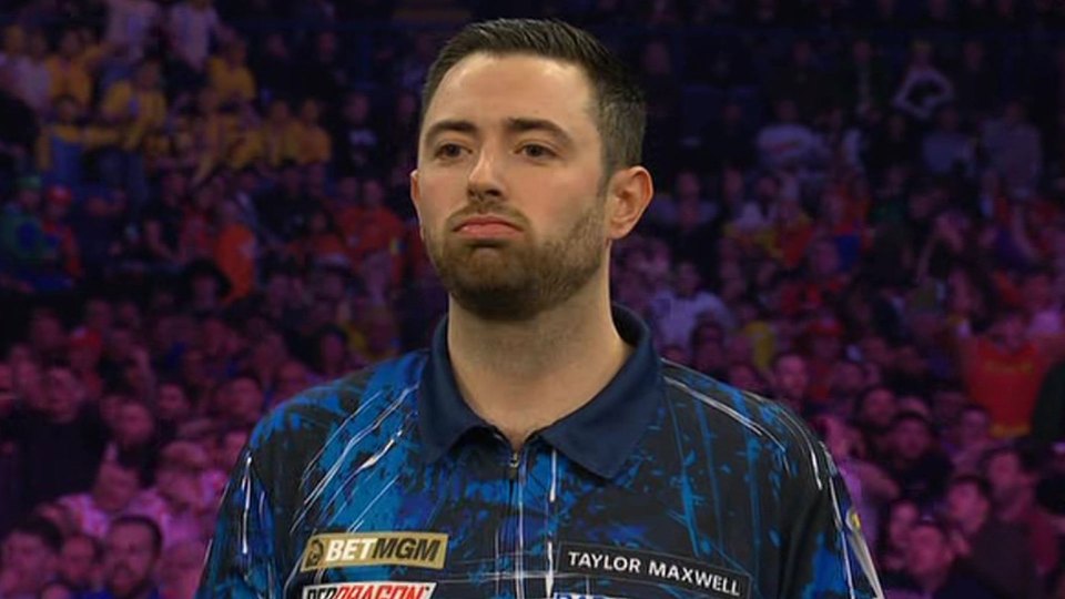 Taylor Maxwell at a darts tournament.