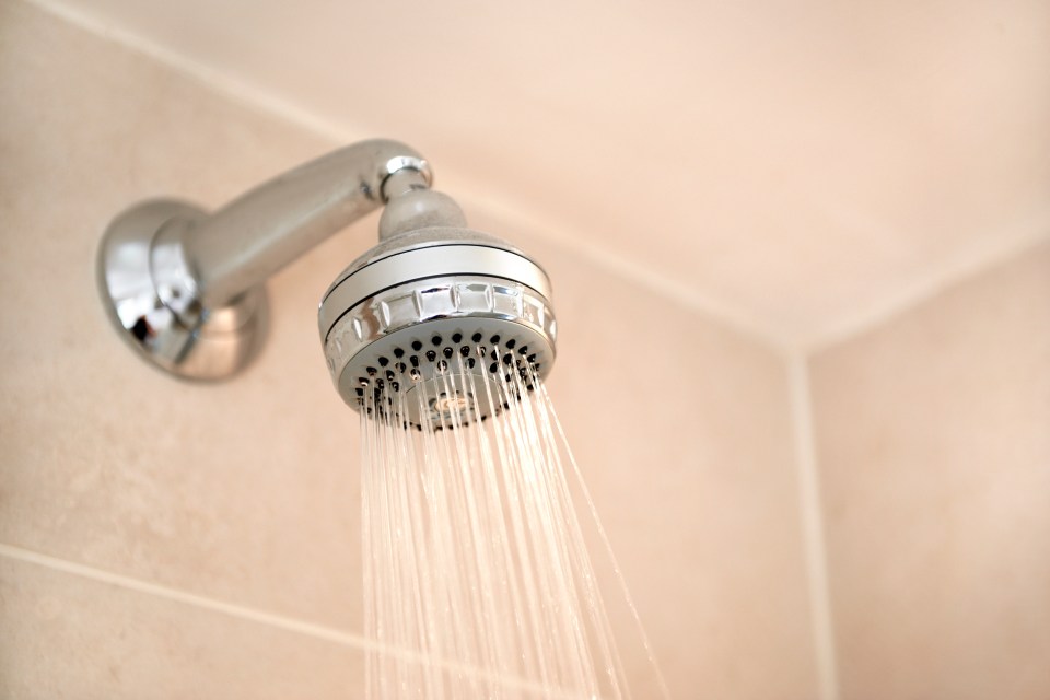 Shower head with water spraying.