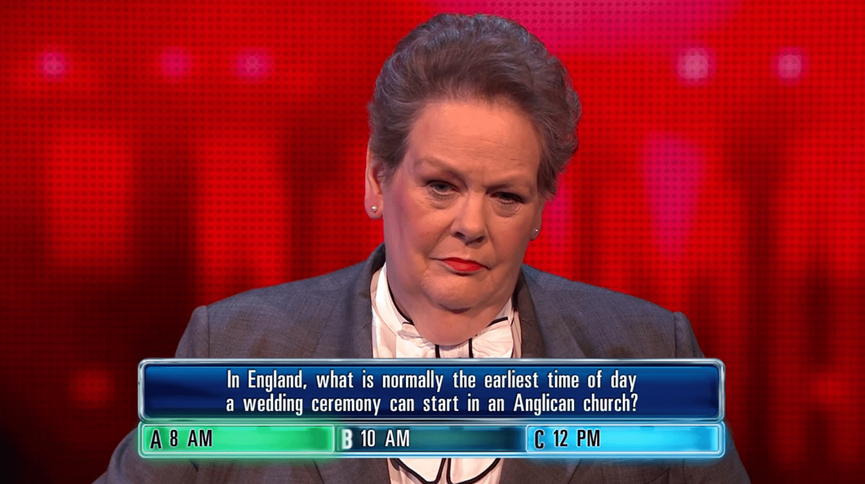 Screenshot of a contestant on a game show considering the question: In England, what is normally the earliest time of day a wedding ceremony can start in an Anglican church?  The options are 8 AM, 10 AM, and 12 PM.