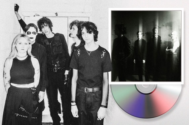Band photo with album art and CD.