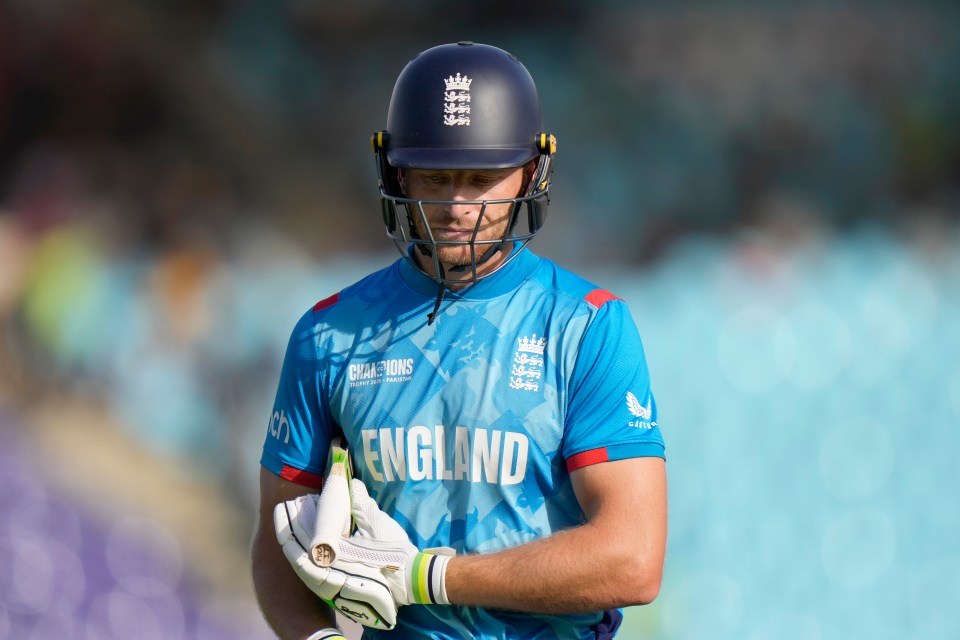 Jos Buttler of England walking off the field after being dismissed during a cricket match.
