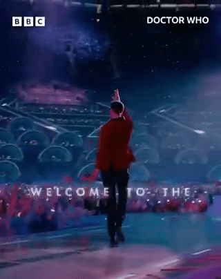 TV presenter on Doctor Who stage.