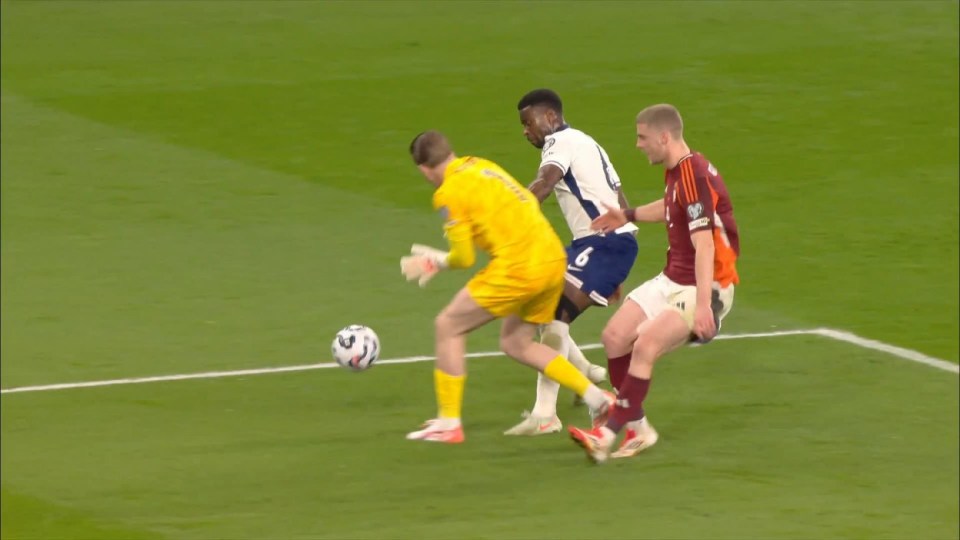 Soccer players vying for the ball.