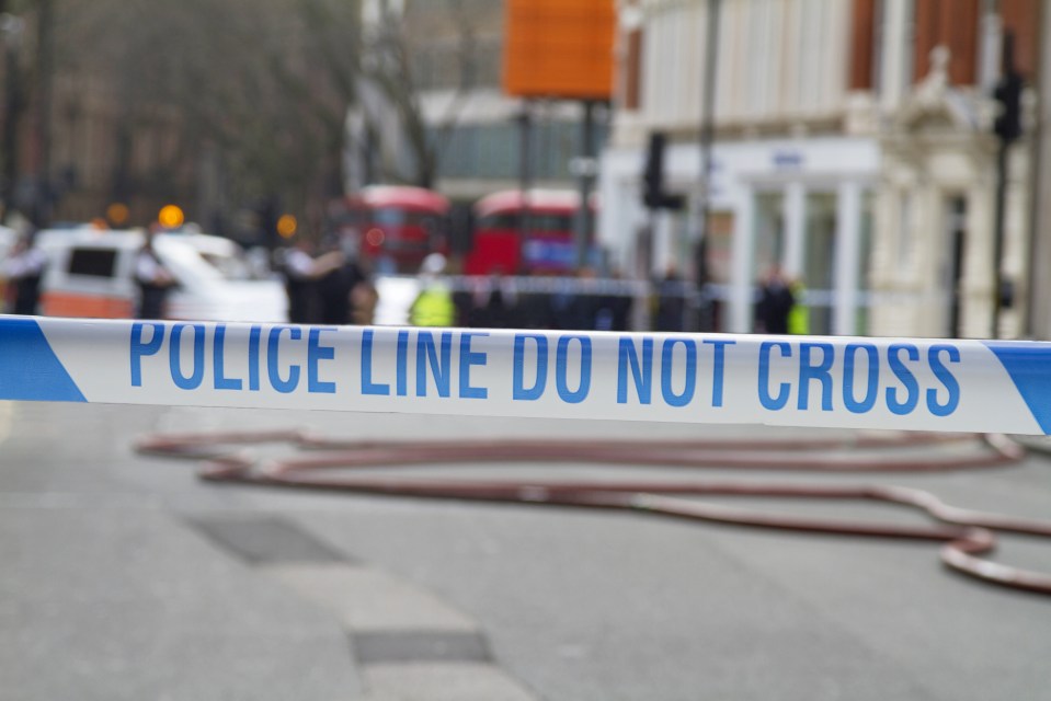 Police line tape: Do not cross.