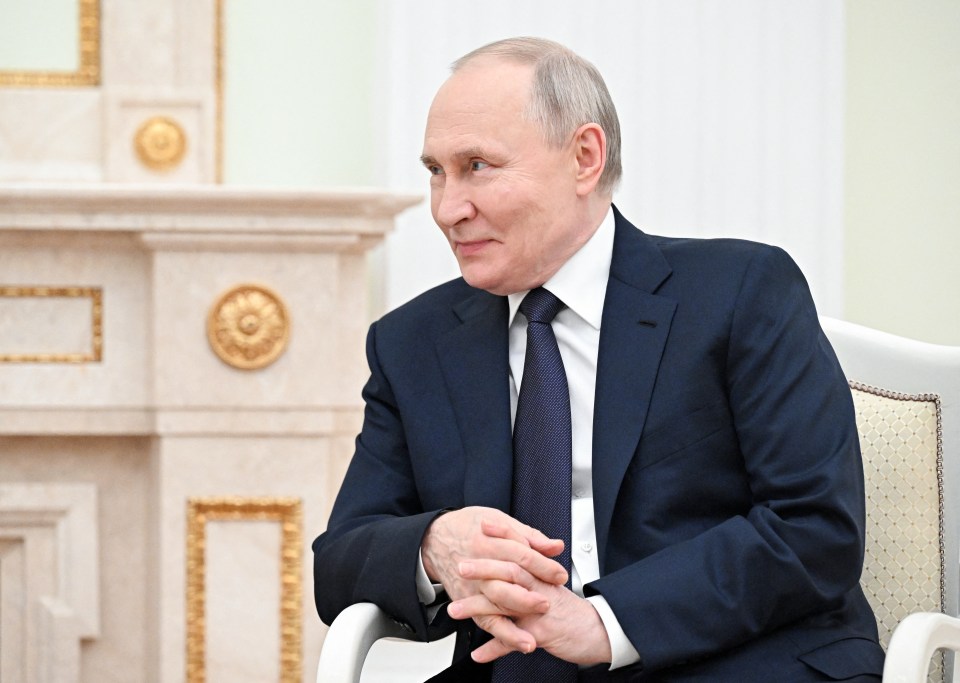 Vladimir Putin in a meeting.