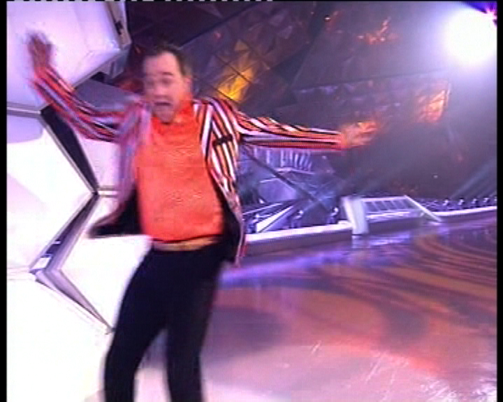 Todd Carty falling on the ice during a Dancing on Ice performance.