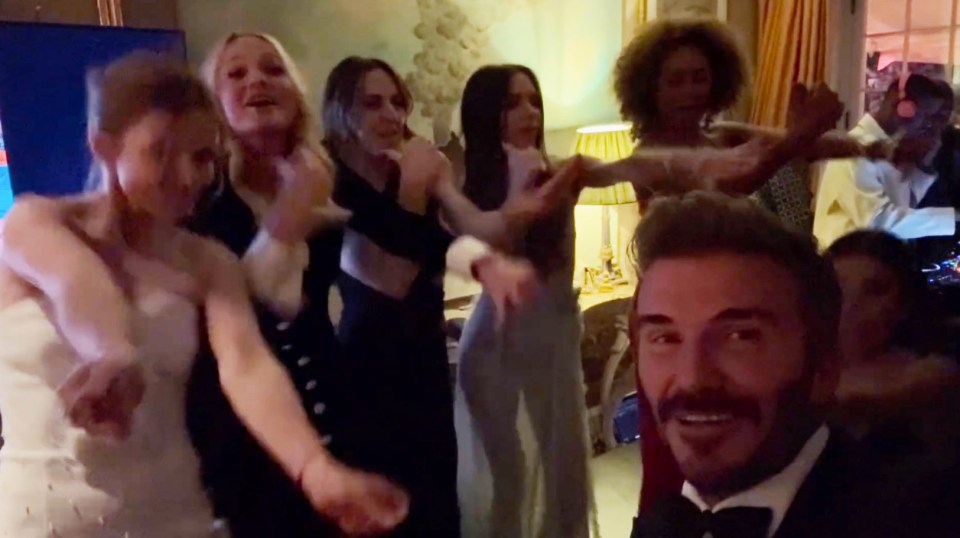 Spice Girls and David Beckham at a party.
