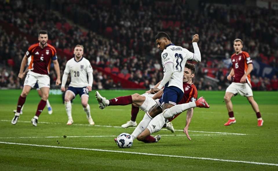 Marcus Rashford of England attempts to cross the ball during an England vs. Latvia FIFA World Cup Qualifying match at Wembley Stadium.