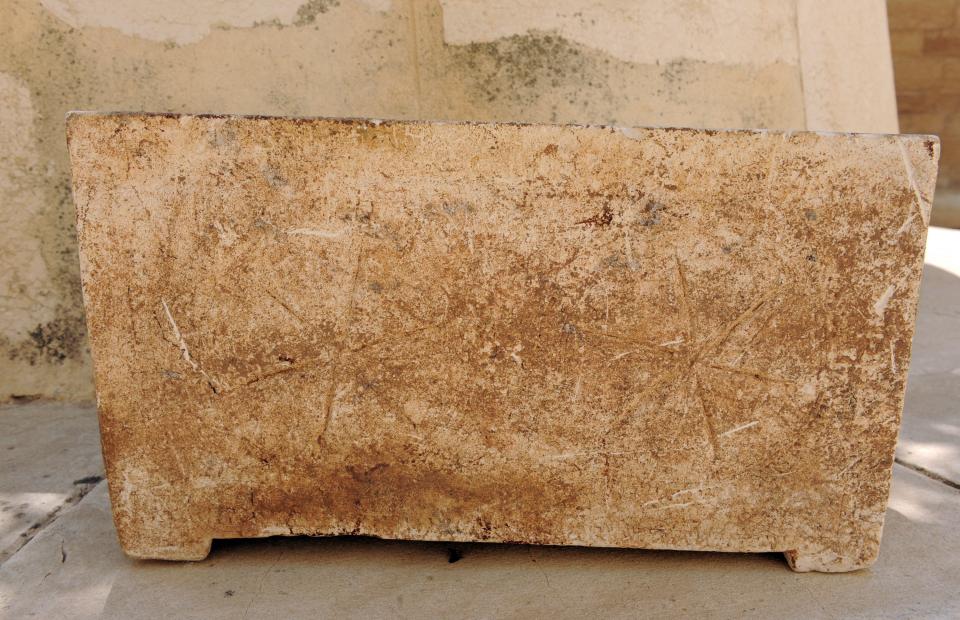 2000-year-old ossuary with inscription.
