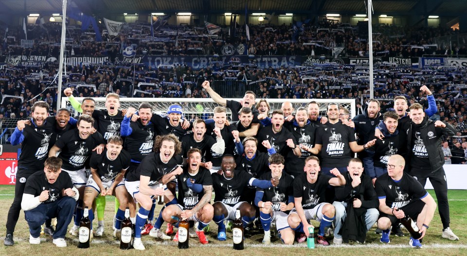 Arminia Bielefeld players celebrating their DFB Cup semi-final victory.