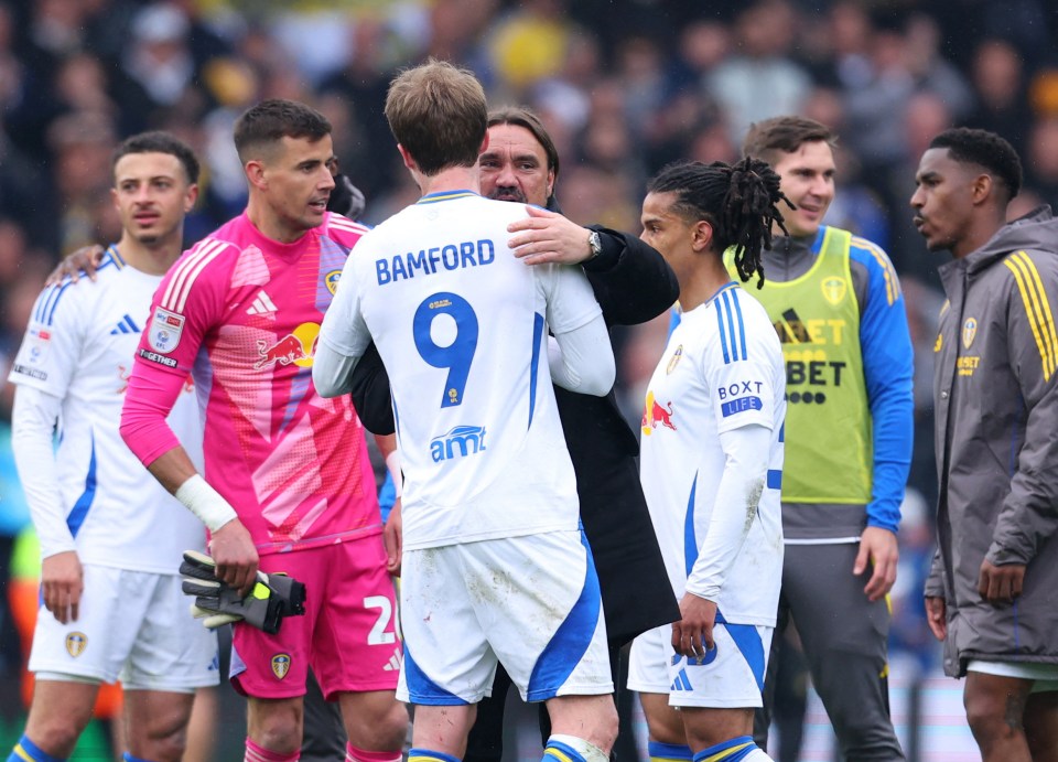 Leeds United manager Daniel Farke celebrates with Patrick Bamford after a match.