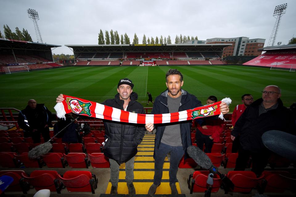 Rob McElhenney and Ryan Reynolds at a Wrexham AFC press conference.
