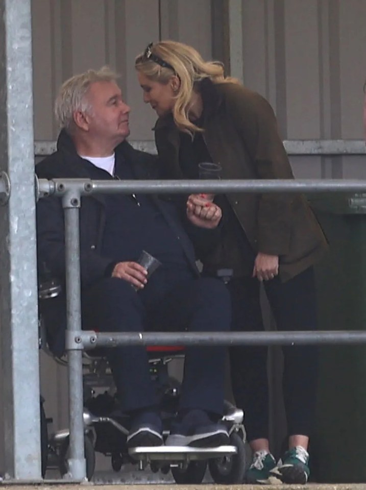 Eamon Holmes and Kate Alexandra at a football match.