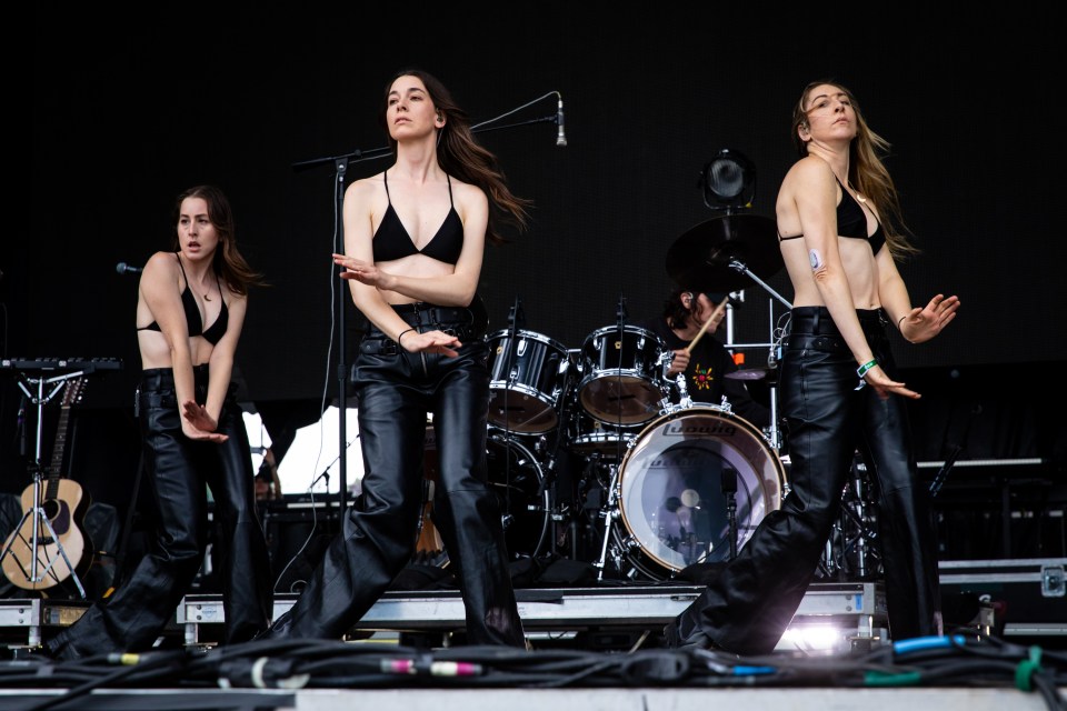 Haim performing on stage.