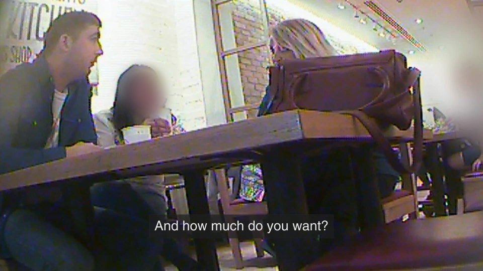 Still image from a documentary showing an undercover reporter meeting a man illegally selling organs.
