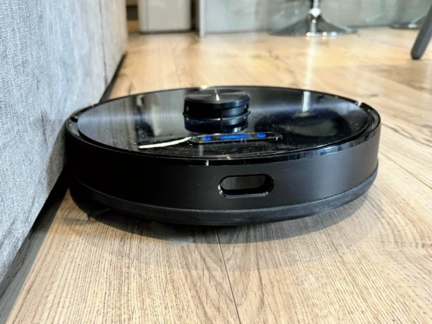 Proscenic M9 robot vacuum cleaner on hardwood floor.