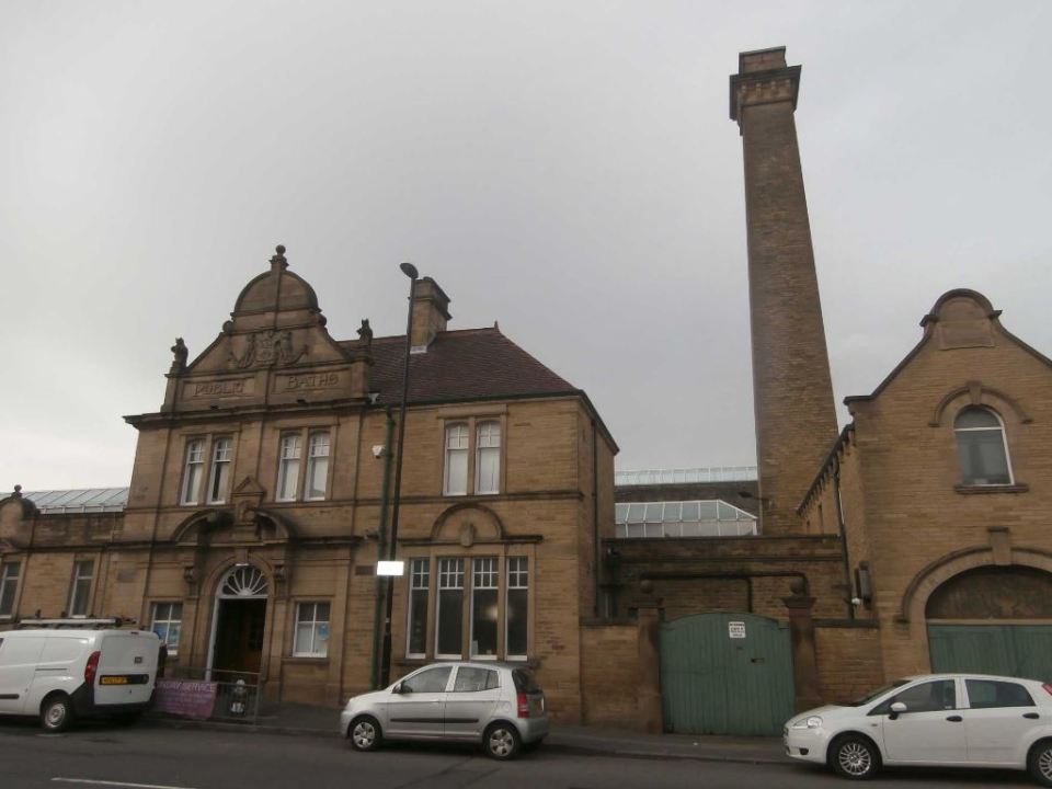 Bramley Baths building with tall chimney.