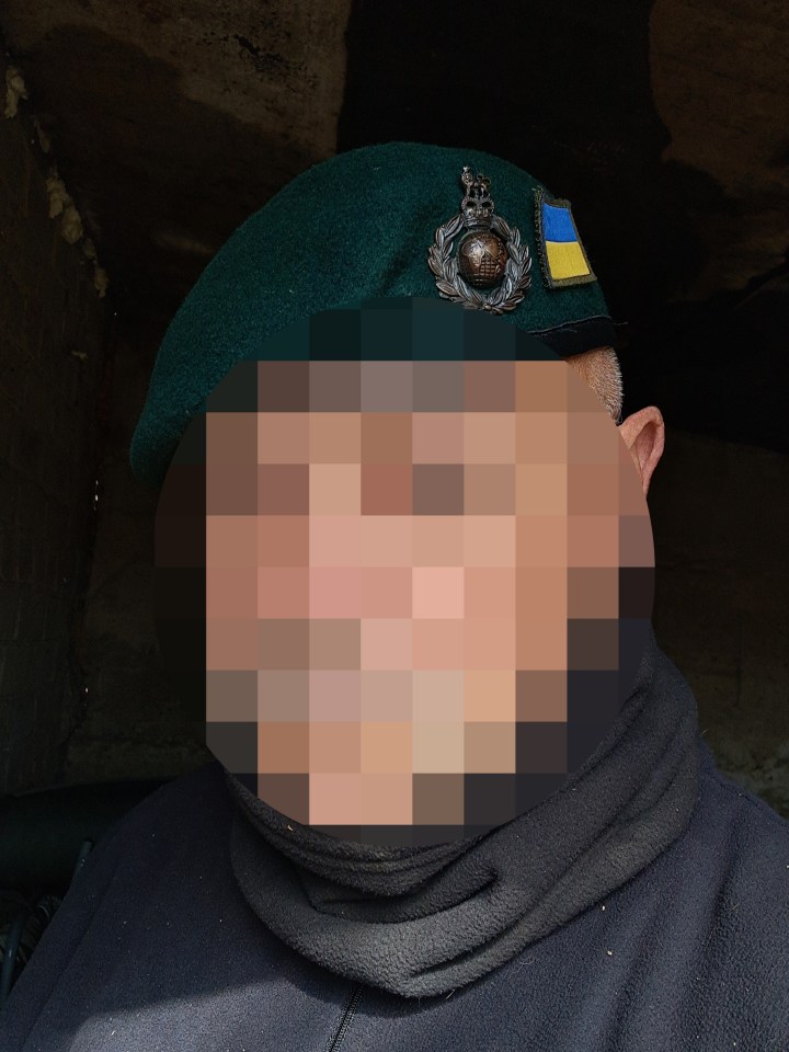 A Royal Marine training Ukrainian gamers to operate drones.