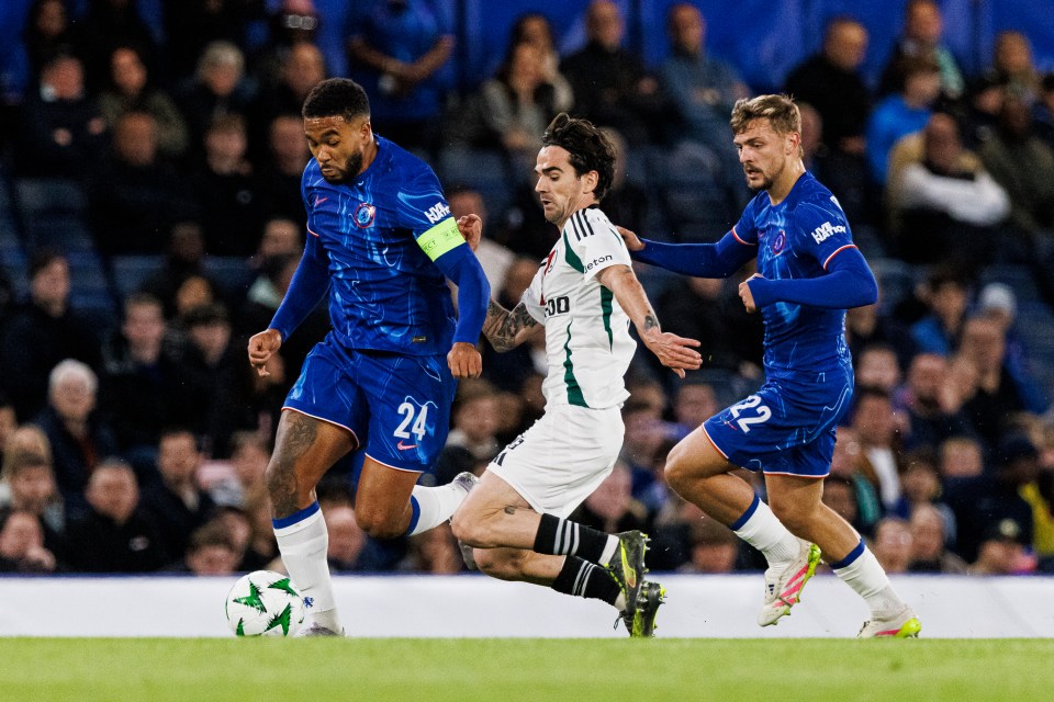 Soccer players vying for the ball during a match.