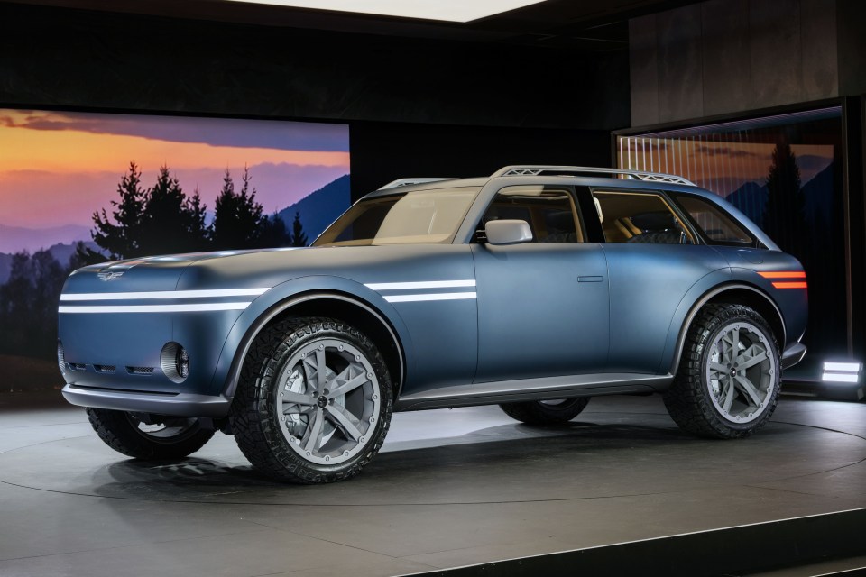 Blue SUV concept car on display.